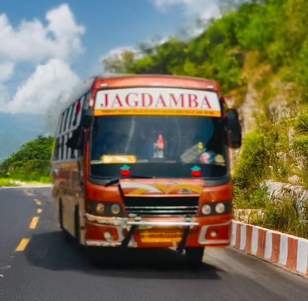 Modern Jagdamba Travels luxury bus on route between cities